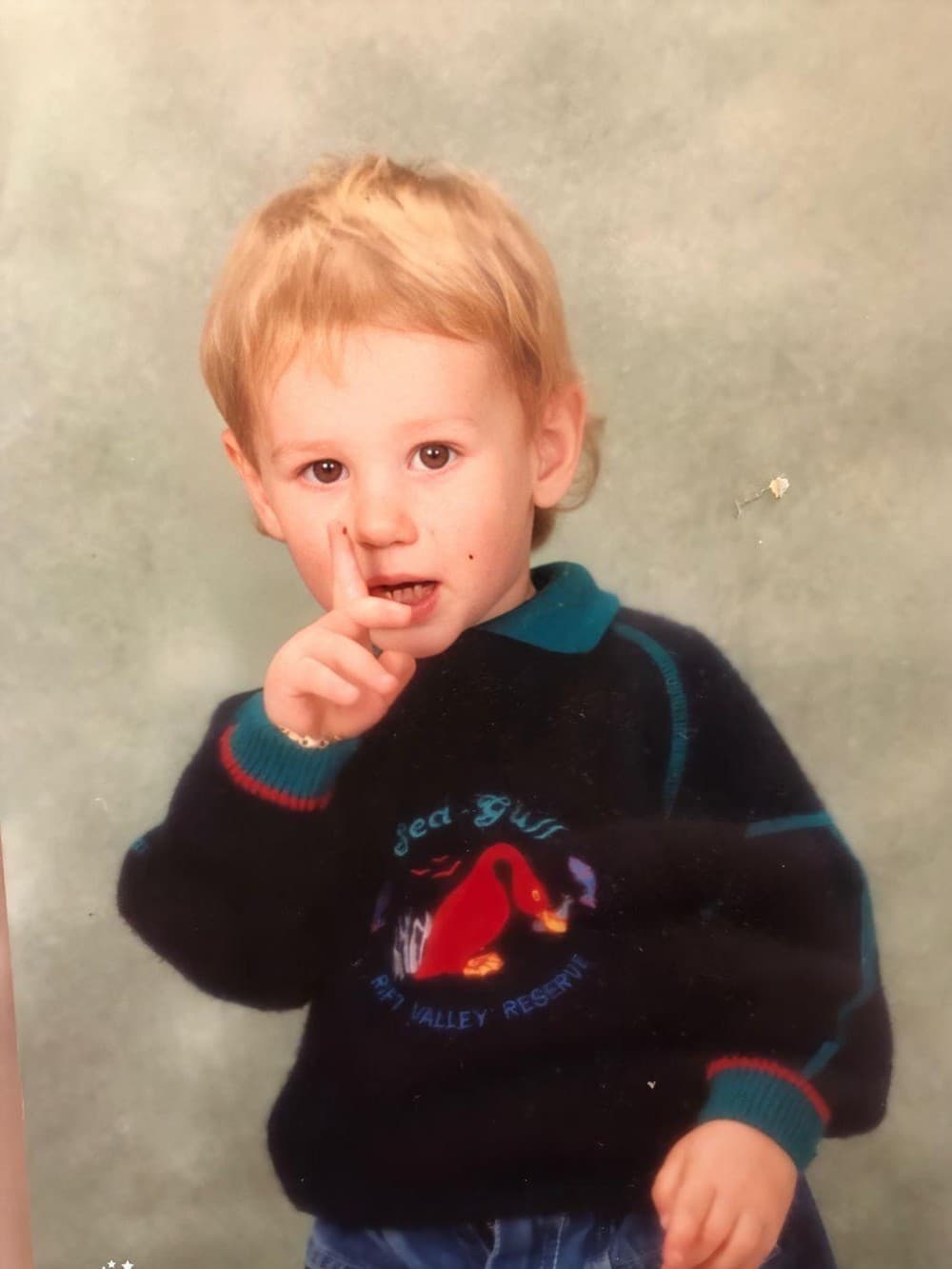 Old childhood photo from a family album, the one photo a custom children's book starts from